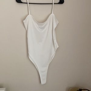 White one piece, super cute on.